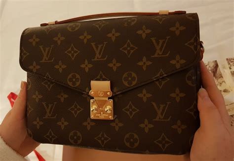 como identificar un bolso louis vuitton original